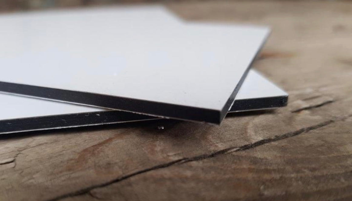 Vintage plaatsnaambord Remunj- 30cm - zwart/wit